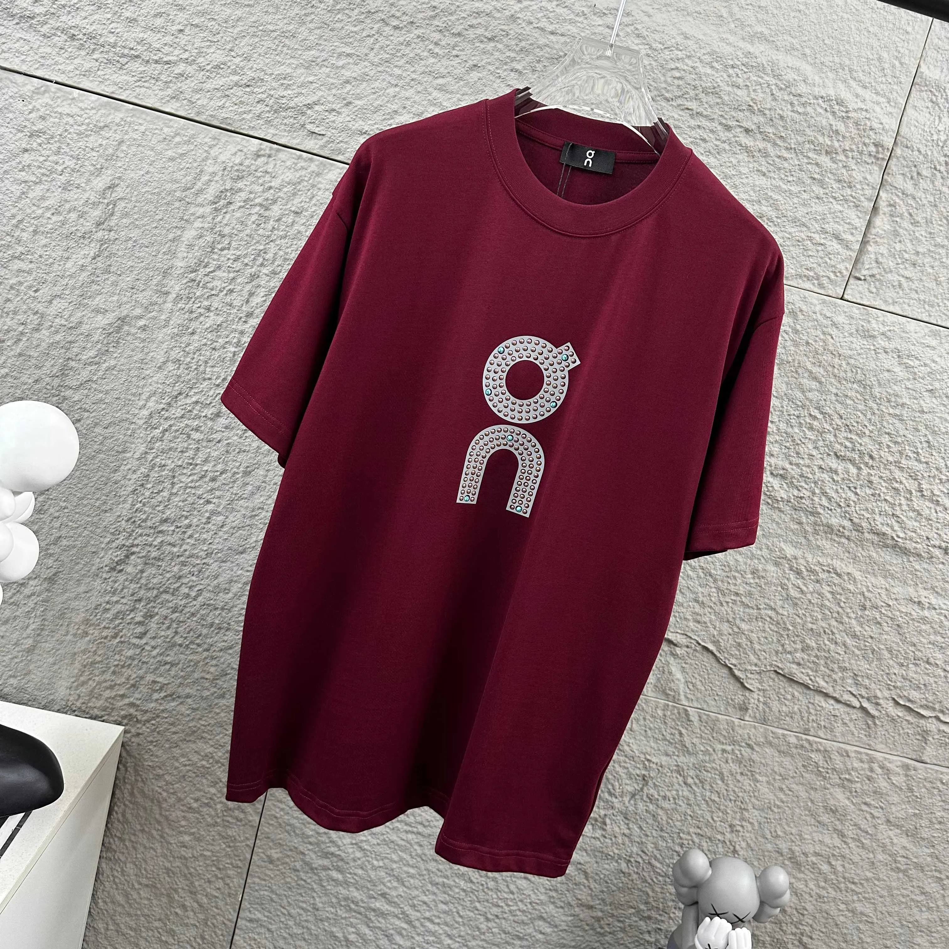 On running Series 2026 Spring and Summer New Arrival Classic simple personalized letter totem three-dimensional thick plate silicone + hot bead process logo custom double yarn plain cotton fabric short-sleeved T-shirt men and women Same Style Color: Black White Angola Red Size: S (90-130 pounds) M (120-150 pounds) L (140-165 pounds) XL (160-180 pounds) XXL (180 pounds)